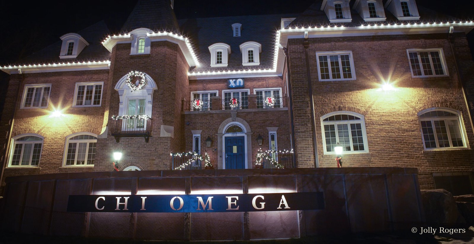 Chi Omega sorority house holiday lighting installation