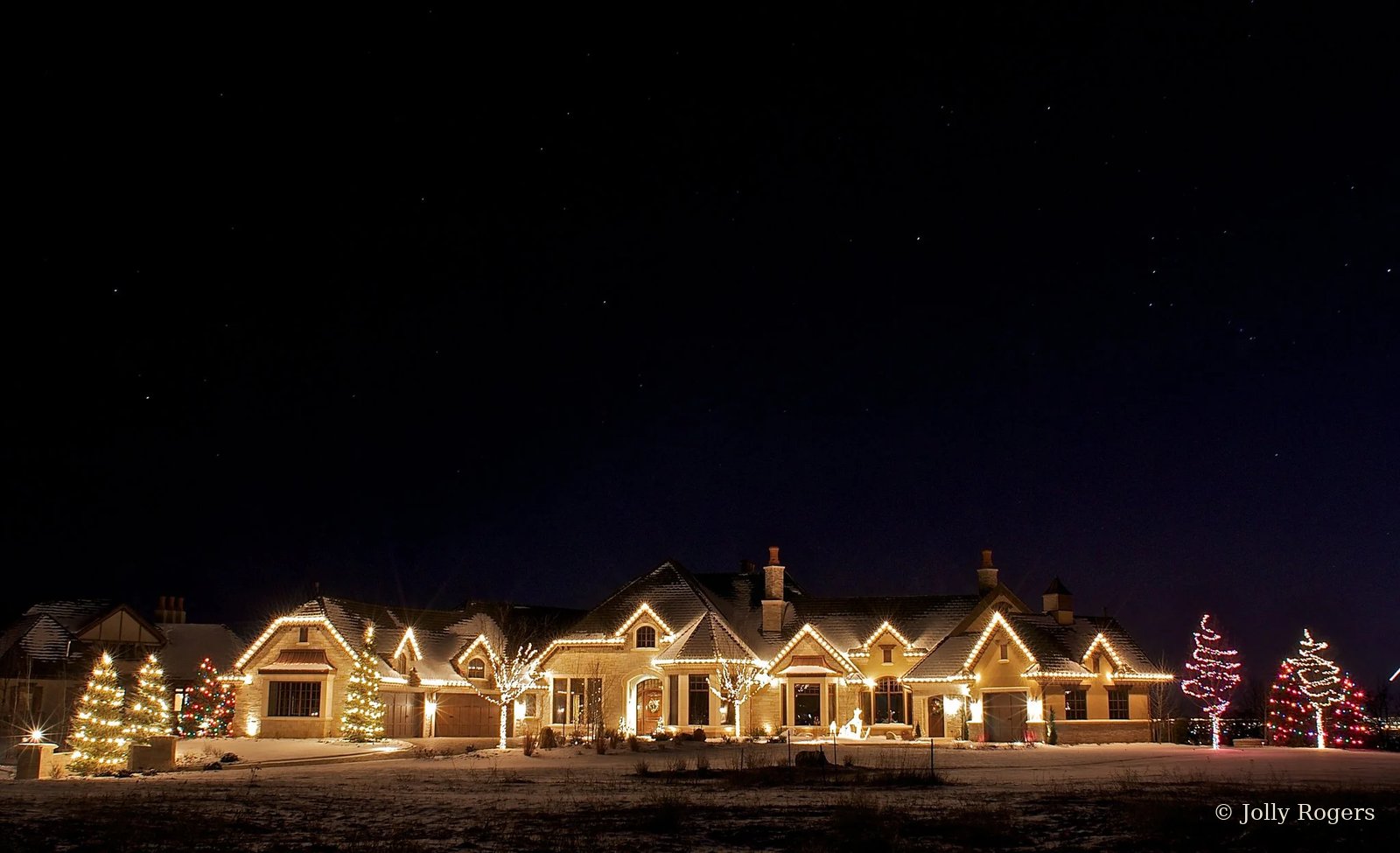 Large estate warm white roofline Christmas lighting